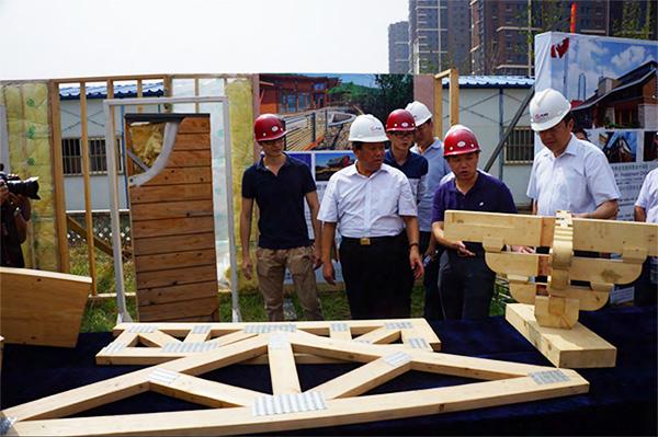昆仑绿建与林创携手在青岛推广现代木结构房屋技术